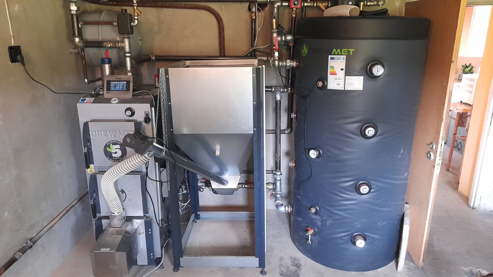 Dostawa oraz montaż kotła zgazowującego drewno Atmos wraz z buforem ciepła oraz zasobnikiem ciepłej wody użytkowej - realizacja TEBAR Opoczno